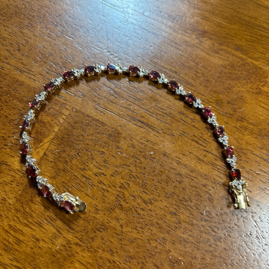 Red And Gold Tennis Bracelet With Symmetrical Design 150$